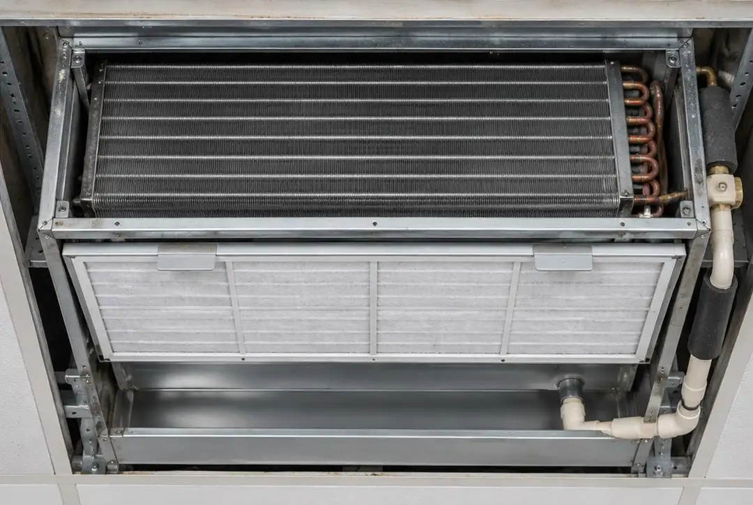 The same fan coil unit after maintenance: clean coil, new filter and clean drain tray